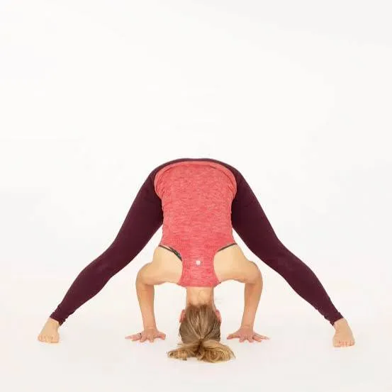 Wide-legged standing forward bend