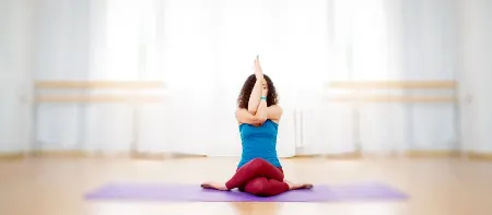 vajrasana garudasana(hero pose with eagel arm)